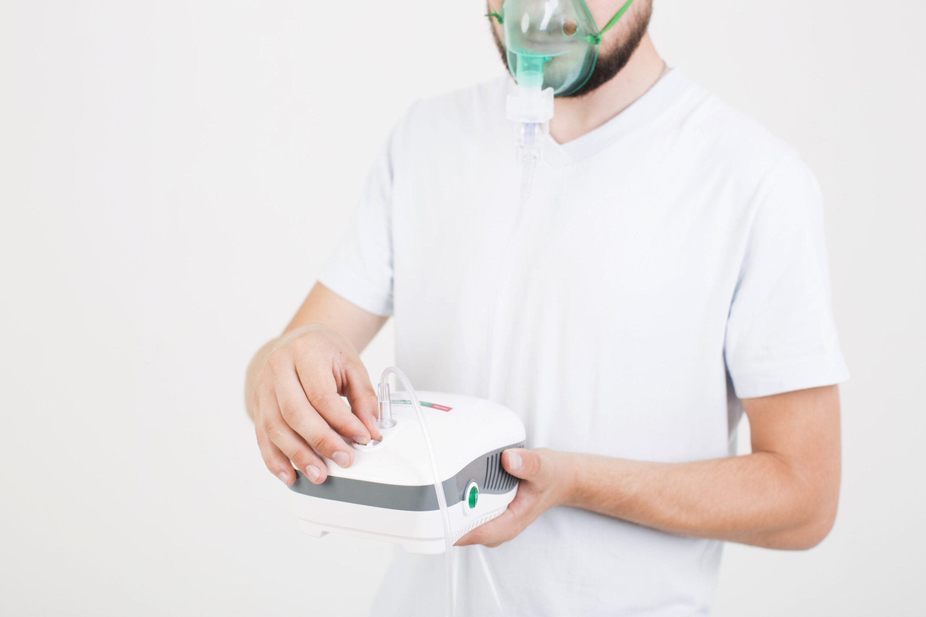 man-setting-medical-nebulizer